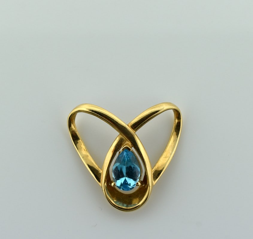 10K Gold and Swiss Blue Topaz Slide Pendant: Pendant weight is 3.6 g. 10K gold weight is ~2.9 g. Pear cut topaz is 7 x 10 mm (3.5 carats or 0.7 g). Please read “Auction Details” / “Terms of Sale” for preview, payment, pic