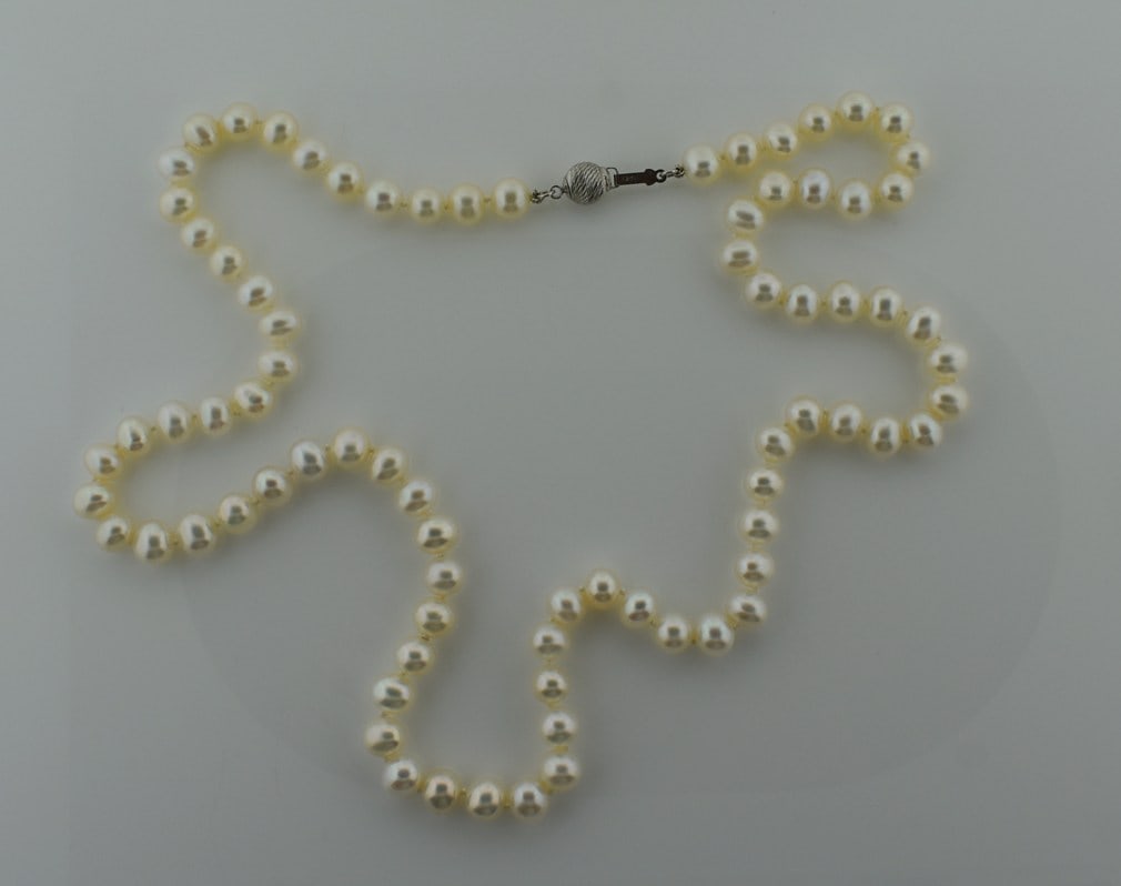 Fine Cultured Pearl 24” Necklace with 8 MM Pinkish White Pearls, Sterling Clasp: Please read “Auction Details” / “Terms of Sale” for preview, payment, pickup, shipping and other instructions. Lot includes the item(s) described in the title.