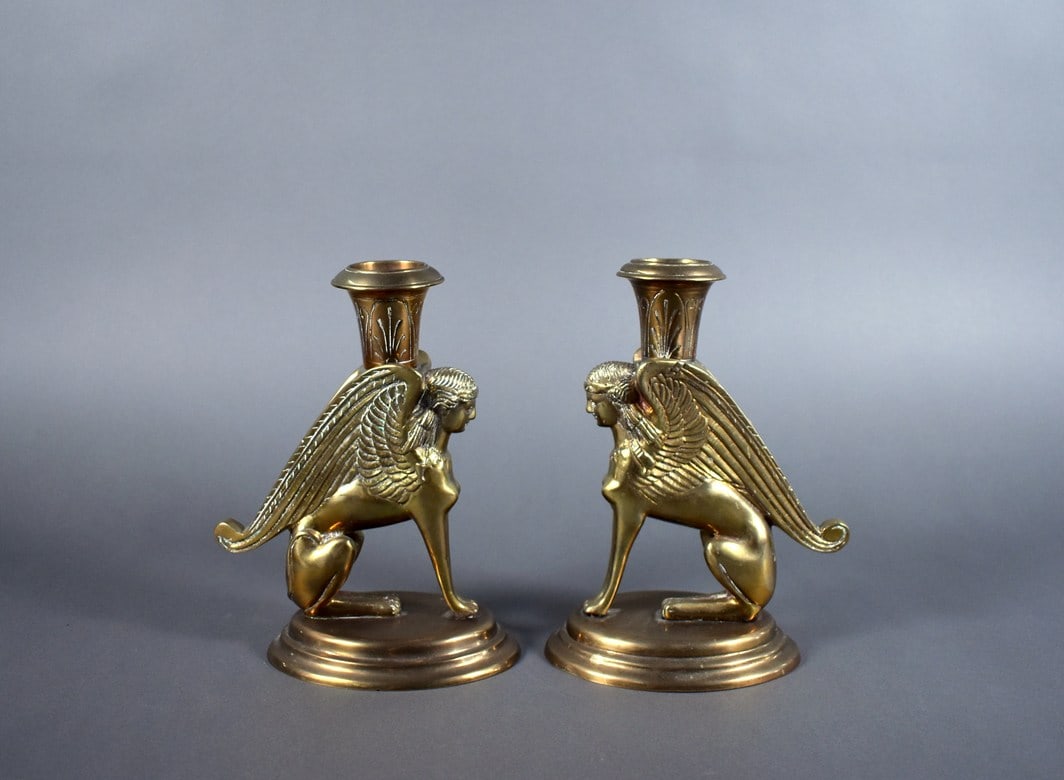 Pair of Egyptian Revival 7” Brass Sphinx Candlesticks, India: Please read “Auction Details” / “Terms of Sale” for preview, payment, pickup, shipping and other instructions. Lot includes the item(s) described in the title.