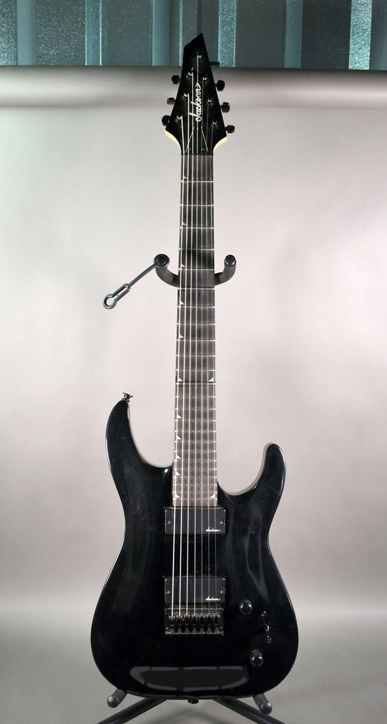 2019 Jackson JS Series Dinky Arch Top JS22-7 DKA HT 7-String Guitar in Gloss Black w/ Hard Case: Very good condition. Has two Jackson humbucker pickups. Serial no. is CWJ1952278. Includes ChromaCast hard case. Please read “Auction Details” / “Terms of Sale” for preview, pa