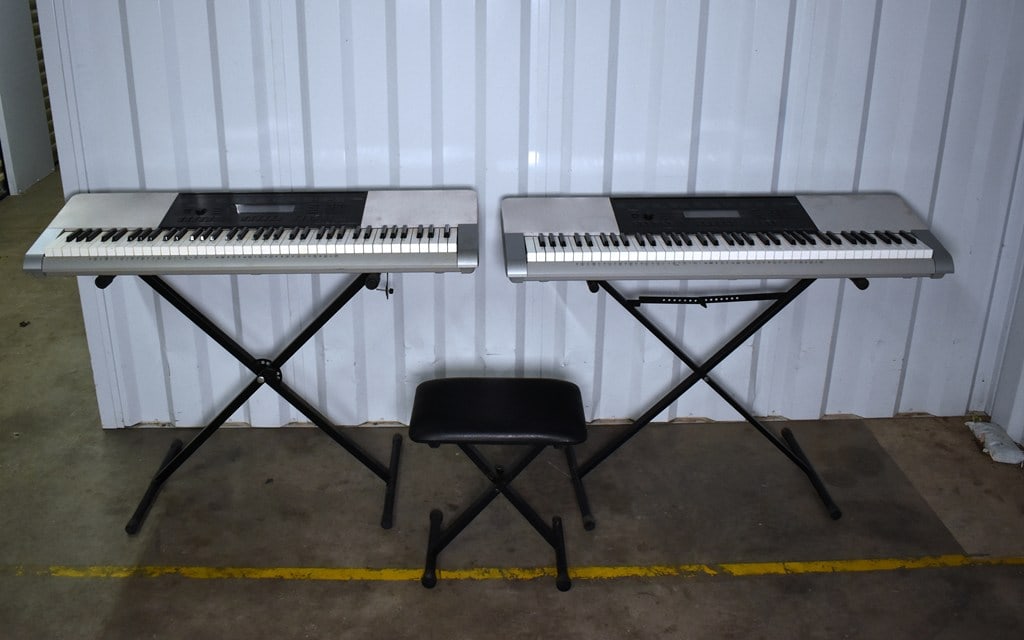 Pair of Casio WK-220 76-Key Portable Keyboards & Stands and One Bench Seat