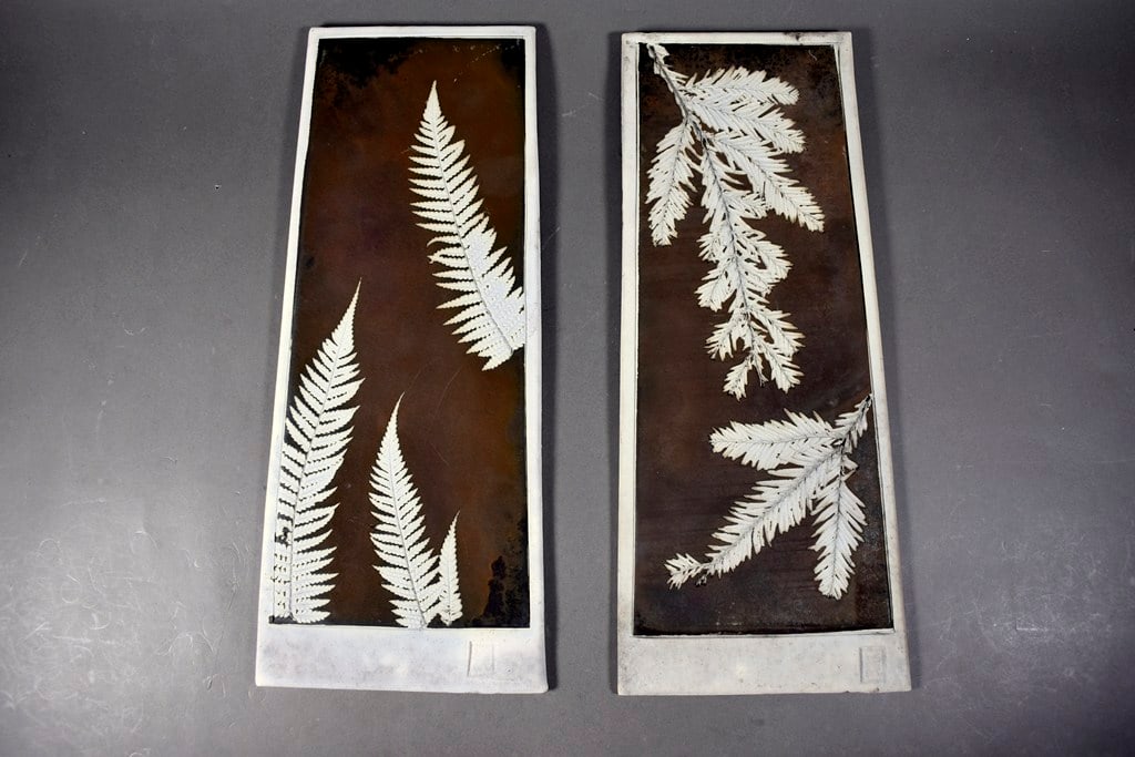 Two Slab-Built Stoneware Wall Decor Plaques with Botanical Motifs: Please read “Auction Details” / “Terms of Sale” for preview, payment, pickup, shipping and other instructions. Lot includes the item(s) described in the title.