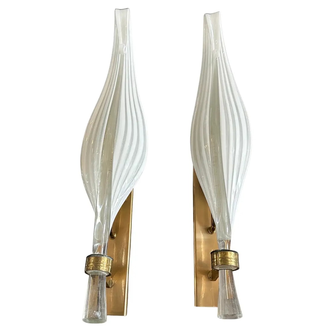 A pair of 1970s Mid-Century Modern Murano Glass Huge Wall Sconces by Franco Luce: This pair of 1970s Mid-Century Modern Murano glass wall sconces by Franco Luce showcases the elegance and artistry of Italian glassmaking. Each sconce features an elongated, sculptural Murano glass sh