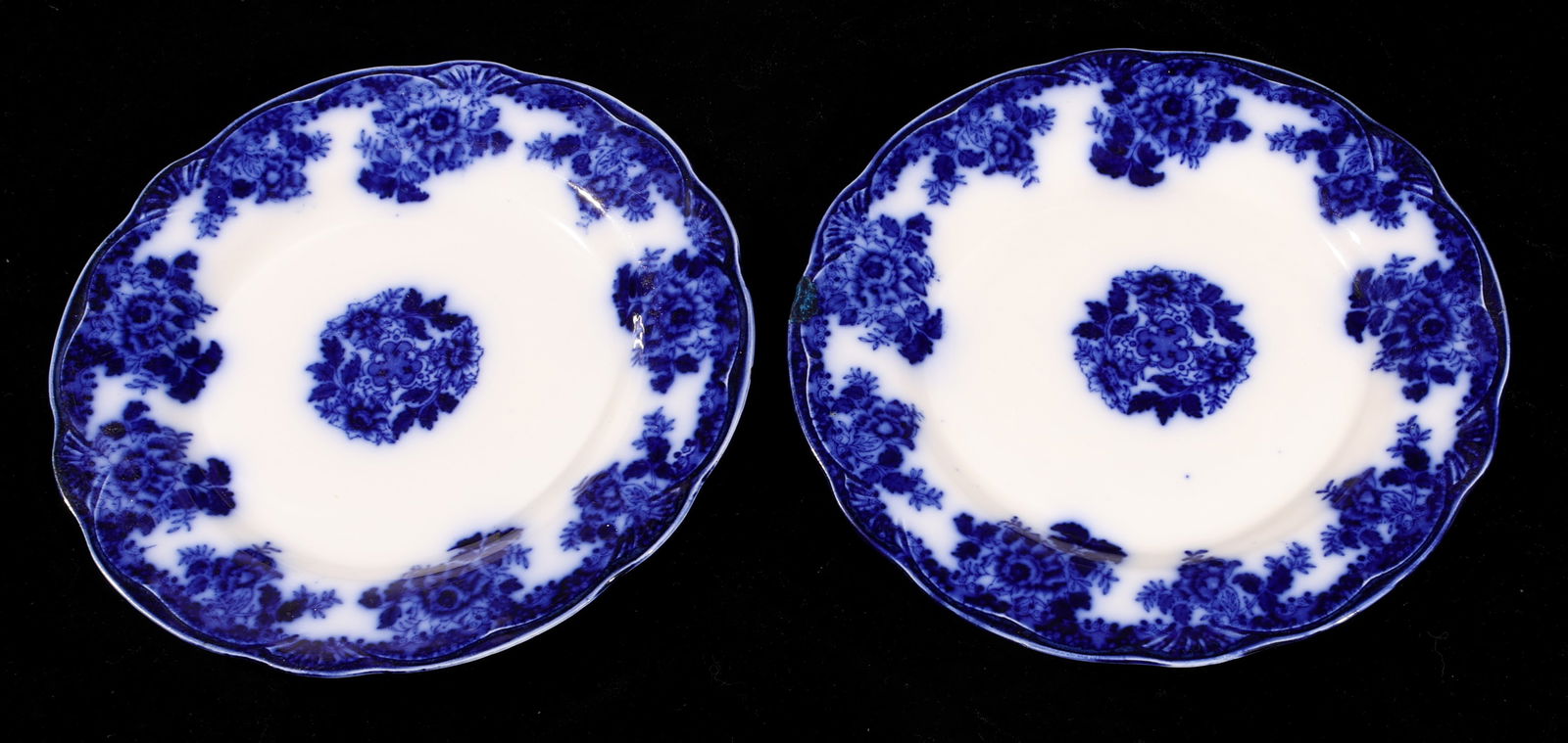 Set of (2) Antique English New Wharf Pottery Flow Blue Waldorf Plates: Set of (2) Antique English New Wharf Pottery Flow Blue Waldorf Plates. Size: 9.75" (25 cm) diameter (each).