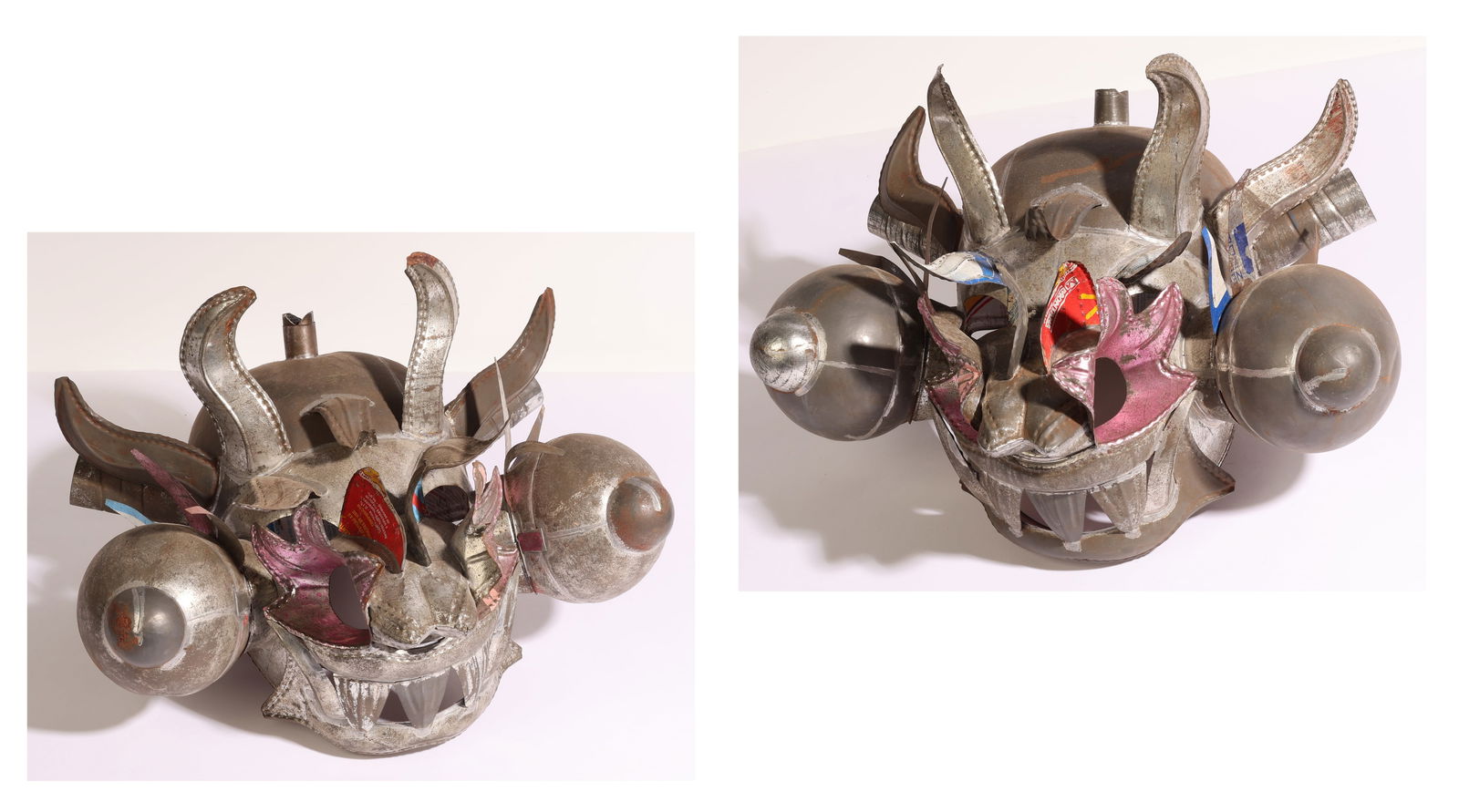 (2) Bolivian Diablo Masks: Bolivian Diablo Mask (20th c.) from the Dance of Diablada, unpainted recycled tin. Each size: 12'' x 16'' x 13'' (30 x 41 x 33 cm).