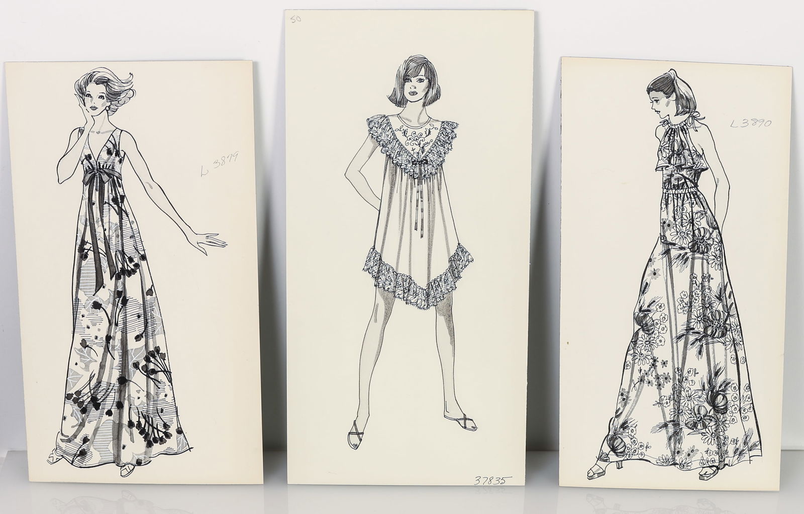 (3) Vintage Fashion Illustrations: (3) Vintage Women's Fashion Illustrations, ink on illustration board. Ranging in size from : 6.25'' x 12'', 16 x 30 cm (smallest); 13.5'' x 6.75'', 34 x 17 cm (largest). Unframed.