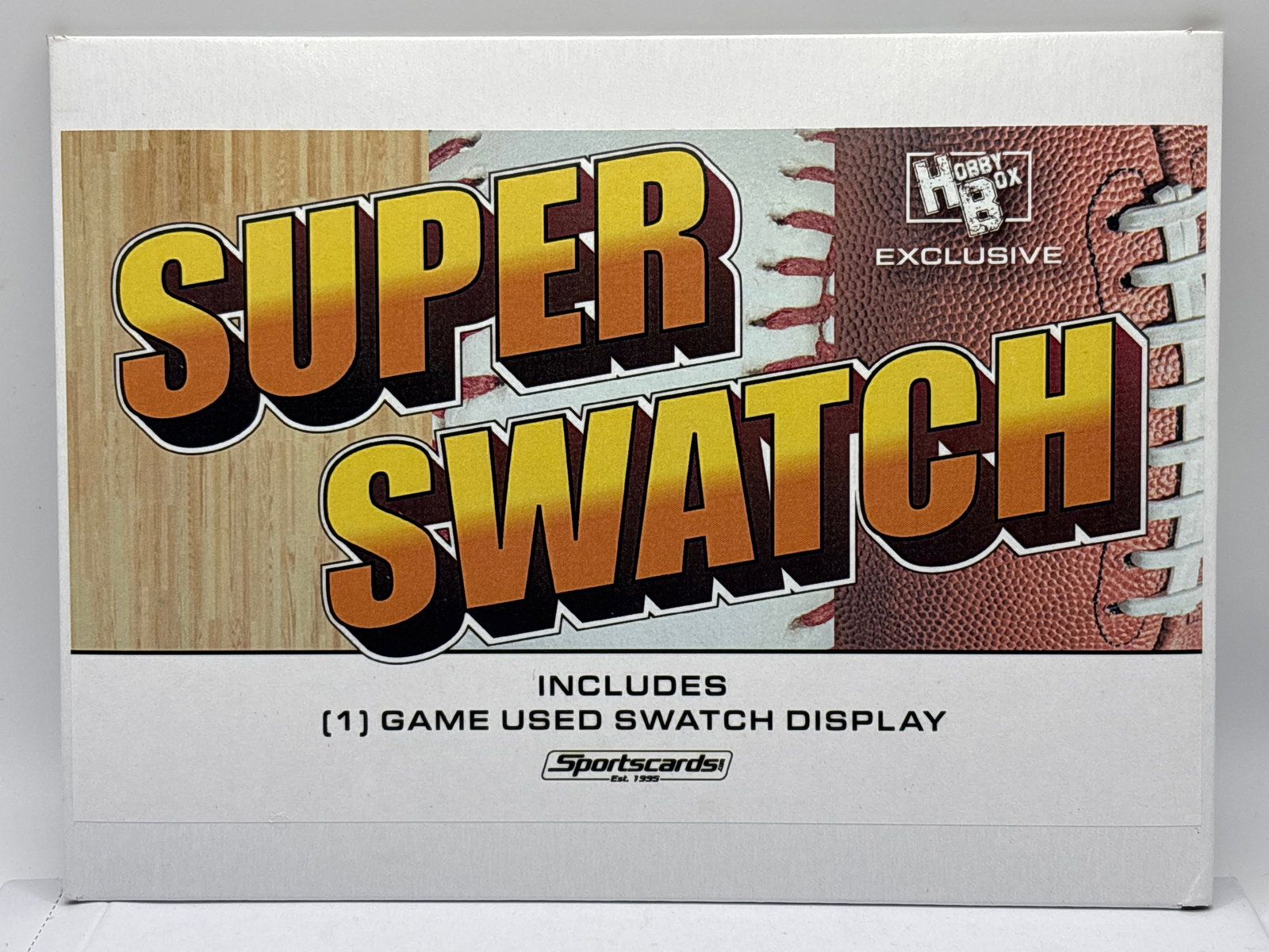 SEALED HOBBY BOX EXCLUSIVE SUPER SWATCH WITH A GAME USED SWATCH DISPLAY (1 of 2)