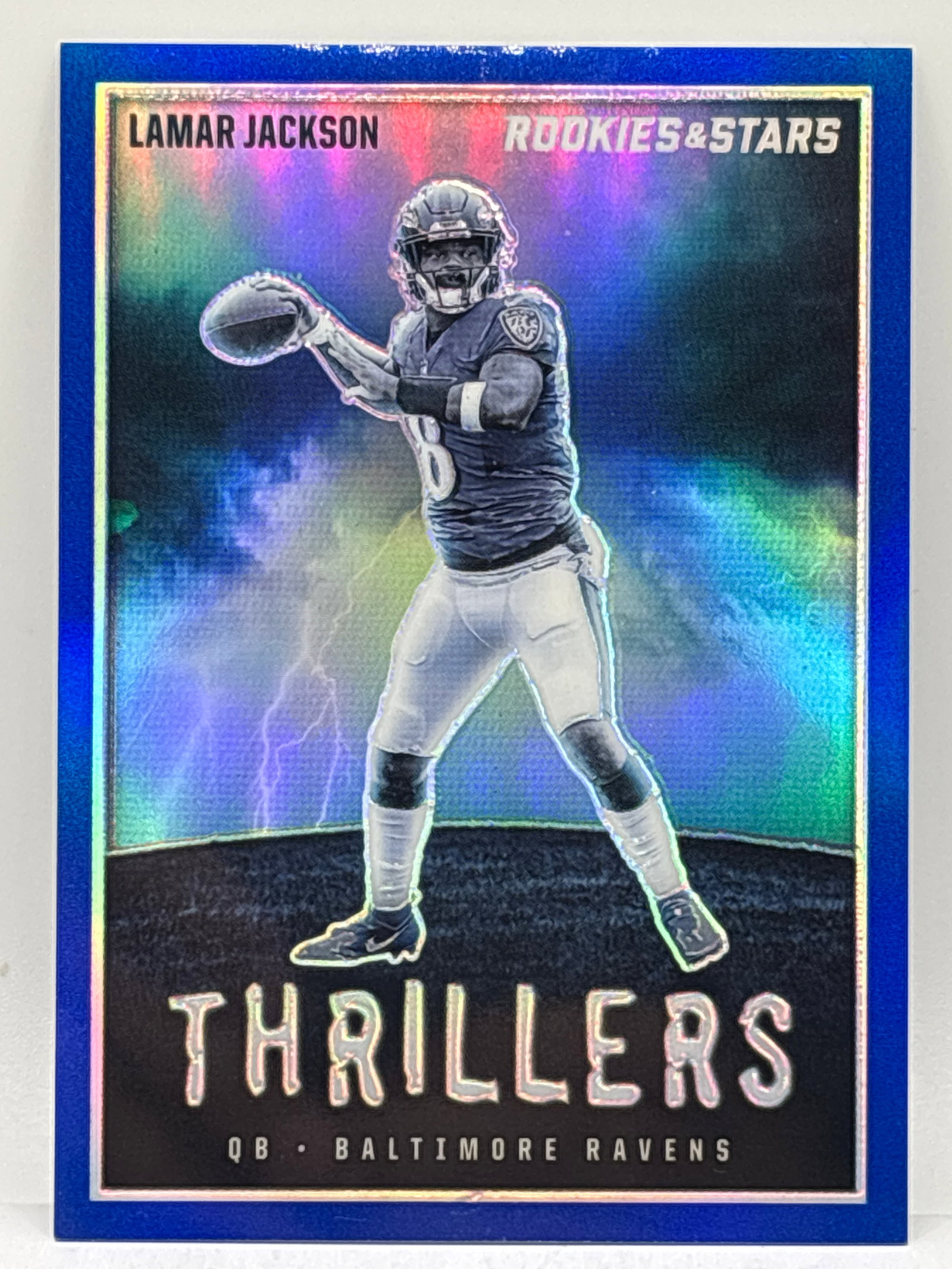 27/50!! 2023 PANINI ROOKIES & STARS LAMAR JACKSON THRILLER INSERT BLUE PRIZM HOLO (1 of 5)