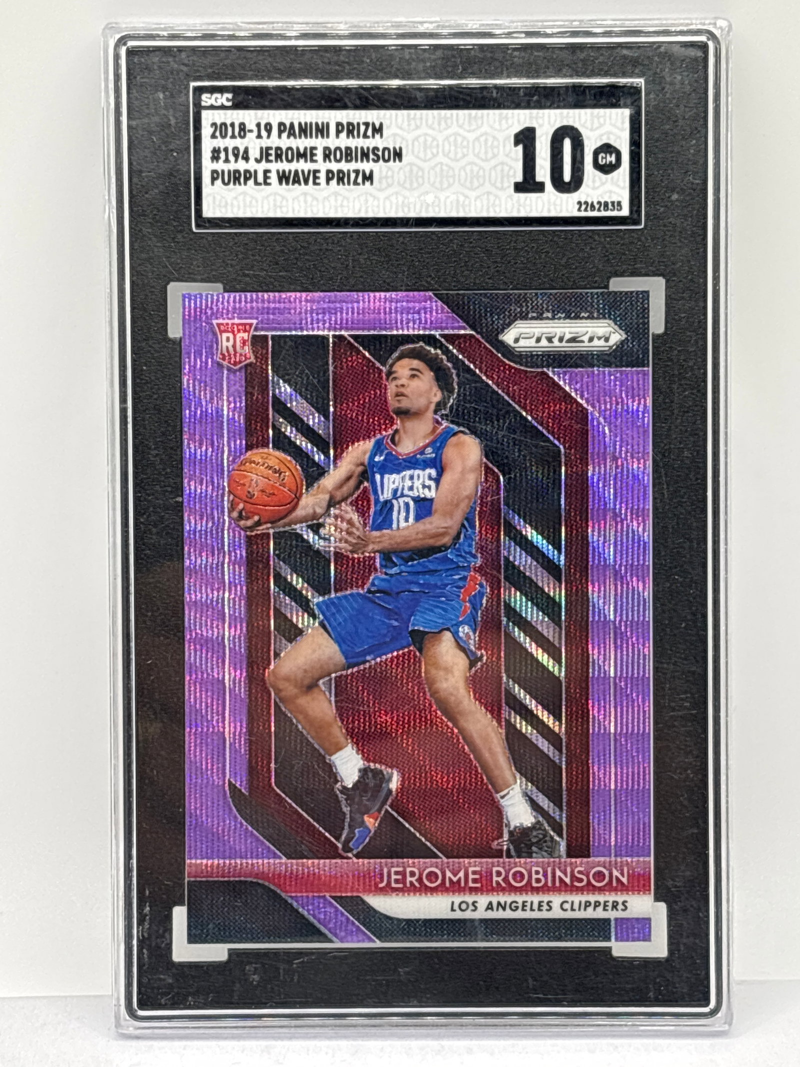 2018-19 PANINI PRIZM JEROME ROBINSON PURPLE WAVE PRIZM HOLO ROOKIE CARD GEADED SGC GEM MINT 10: 2018-19 PANINI PRIZM JEROME ROBINSON PURPLE WAVE PRIZM HOLO ROOKIE CARD GEADED SGC GEM MINT 10Slab is a little scuffed on surface