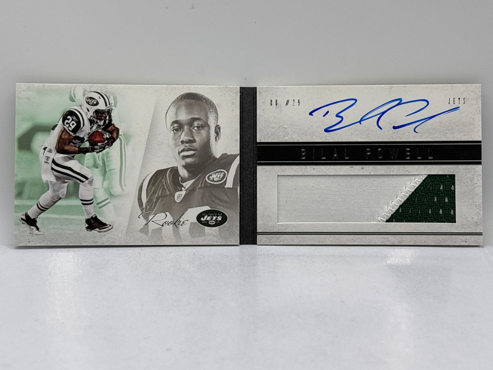 16/99!! 2012 PANINI PLAYBOOK BILAL POWELL 2-COLOR PATCH RPA BOOKLET (1 of 5)
