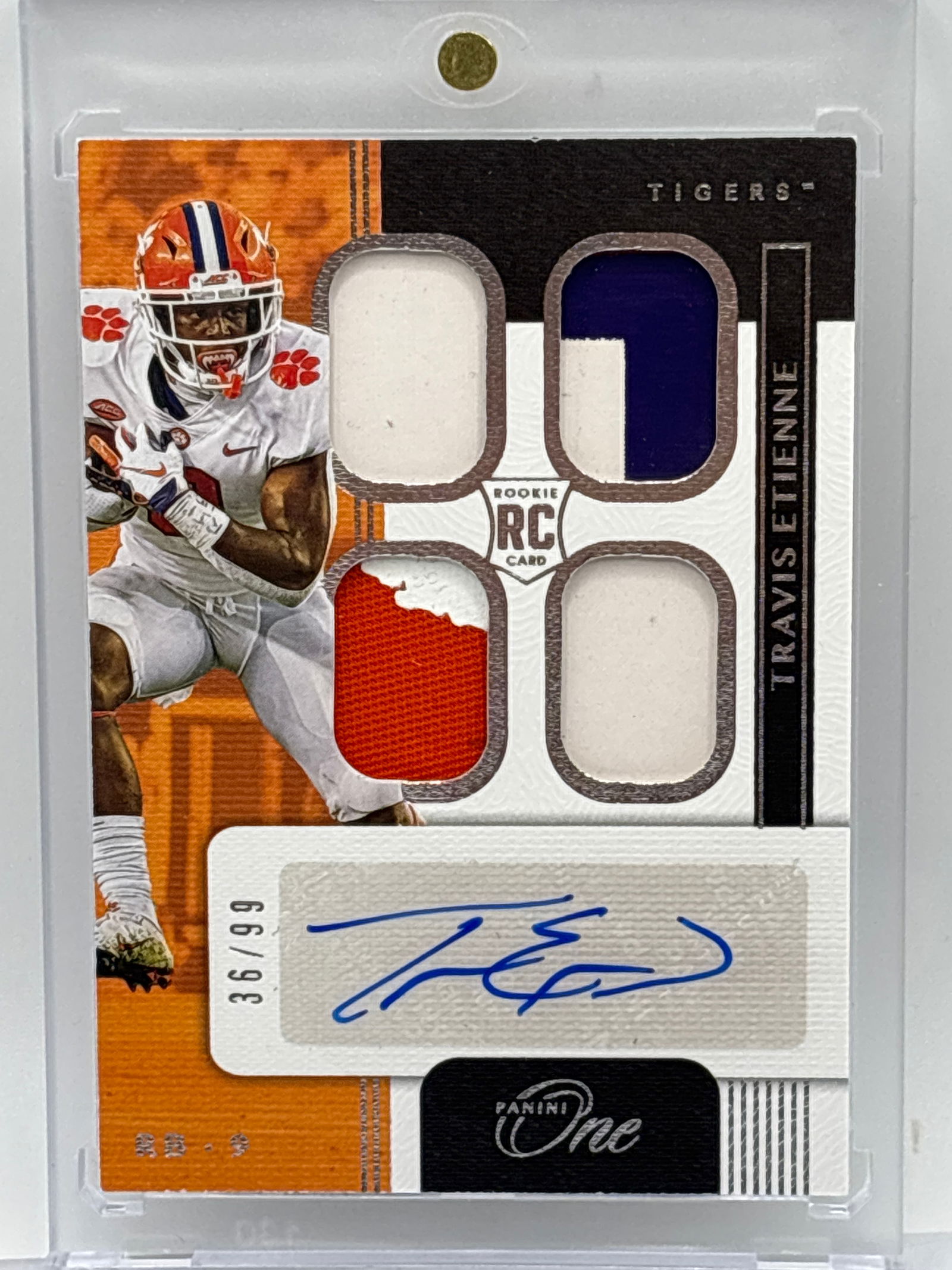 36/99!! 2021 PANINI CHRONICLES PANINI ONE DP RPA TRAVIS ETIENNE AUTOGRAPHED 4 PATCH ROOKIE CARD (1 of 5)