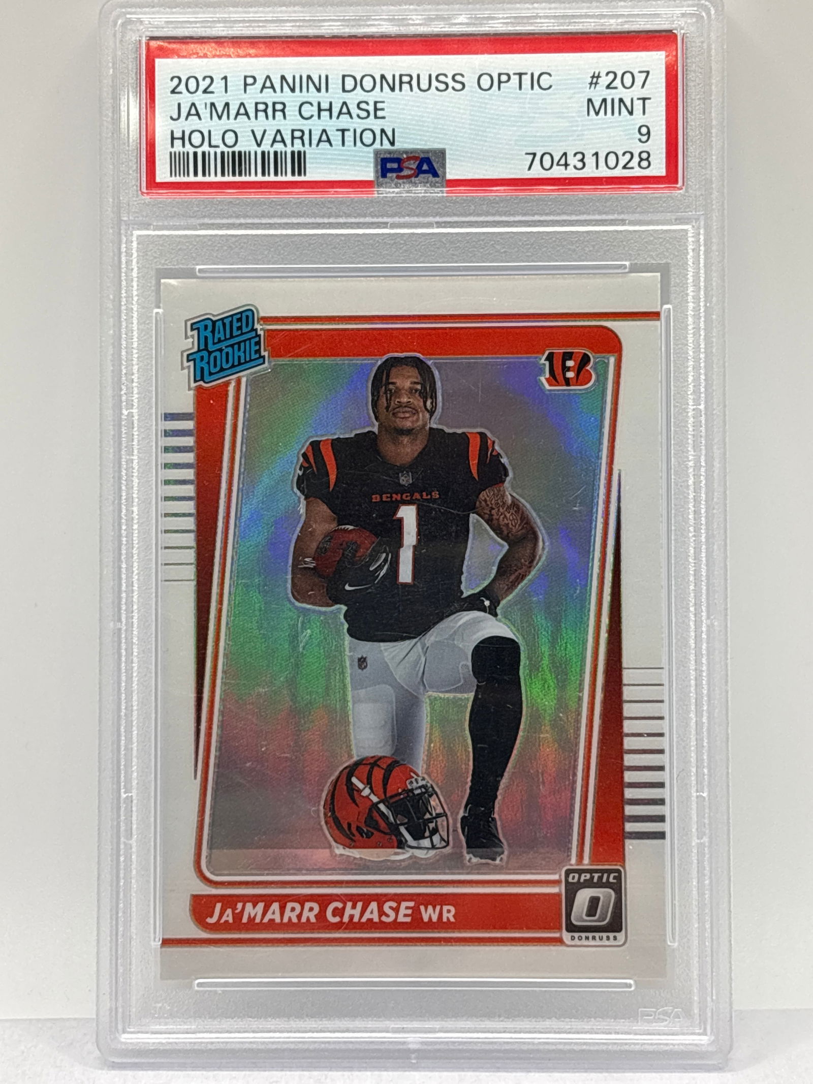 2021 PANINI DONRUSS OPTIC JA’MARR CHASE PRIZM HOLO VARIATION RATED ROOKIE GRADED PSA MINT 9 (1 of 3)