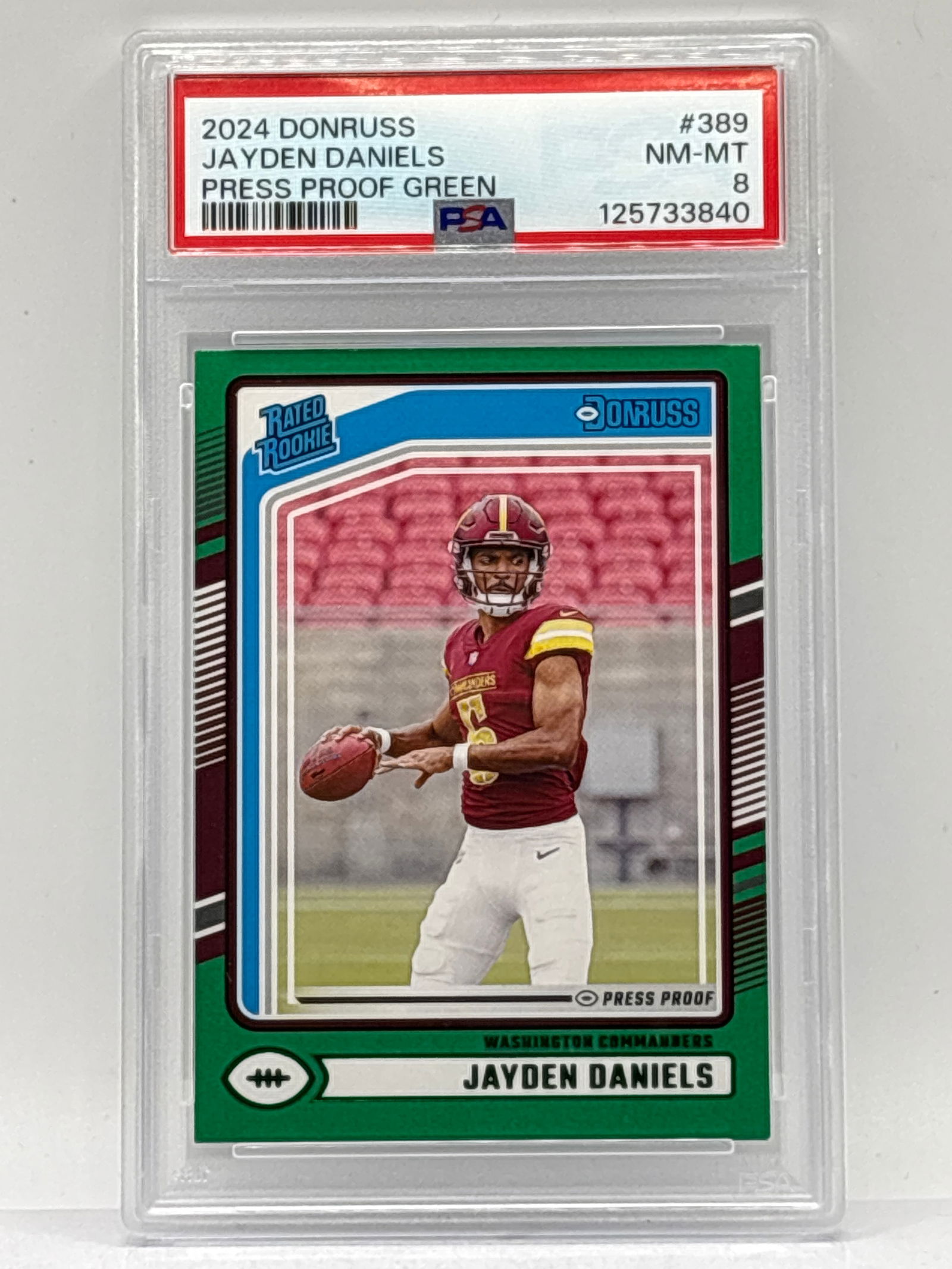 2024 PANINI DONRUSS JAYDEN DANIELS PRESS PROOF GREEN RATED ROOKIE CARD GRADED PSA NM-MT 8 (1 of 2)