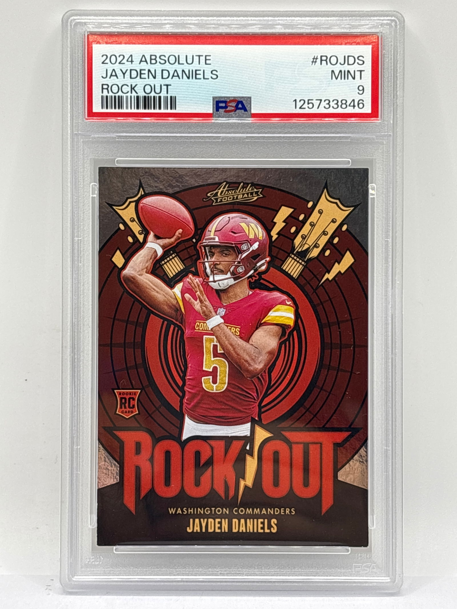 2024 PANINI ABSOLUTE JAYDEN DANIELS ROCK OUT INSERT ROOKIE CARD GRADED PSA MINT 9 (1 of 3)