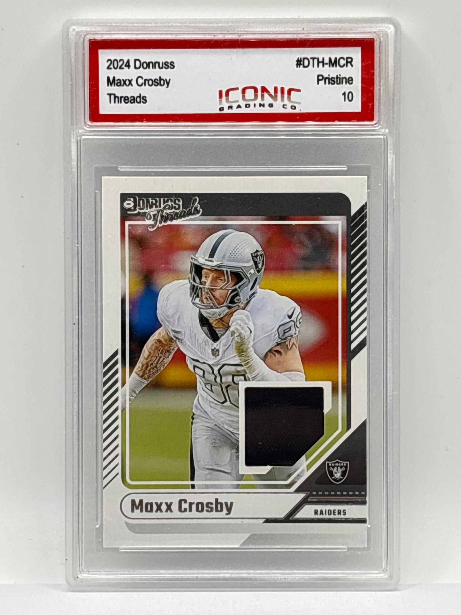 2024 PANINI DONRUSS MAXX CROSBY THREADS PATCH CARD GRADED PRISTINE 10 (1 of 2)
