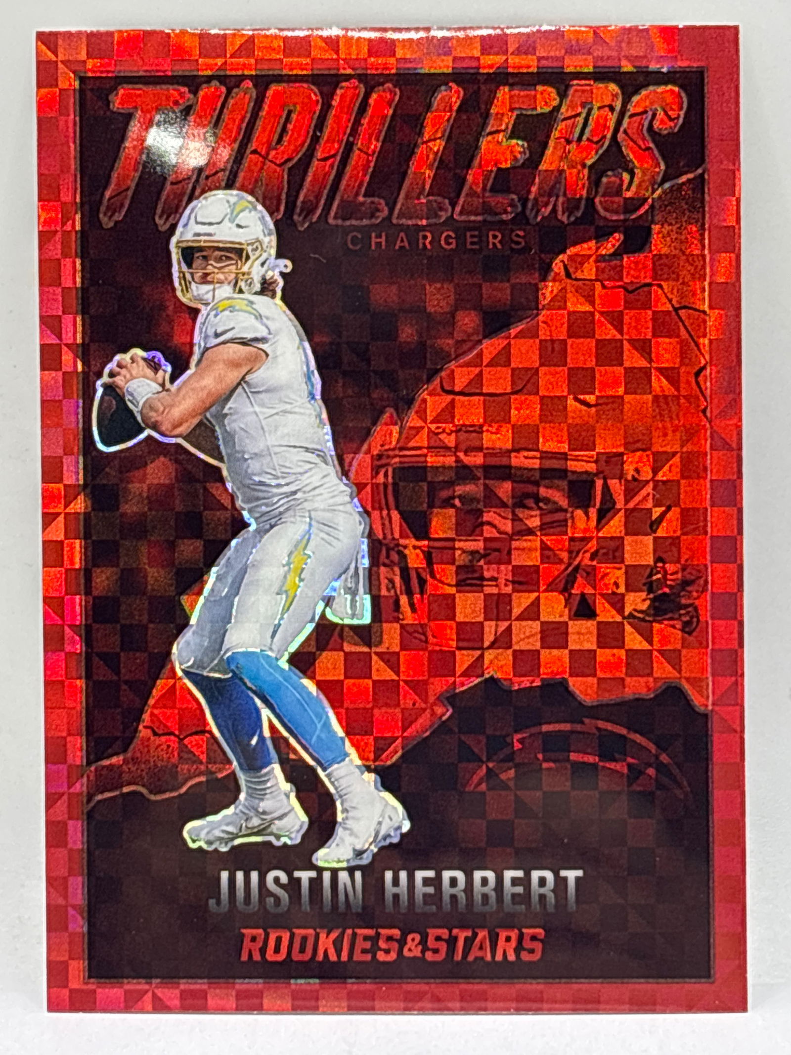 2022 PANINI ROOKIES & STARS JUSTIN HERBERT THRILLERS PRIZM HOLO INSERT (1 of 2)