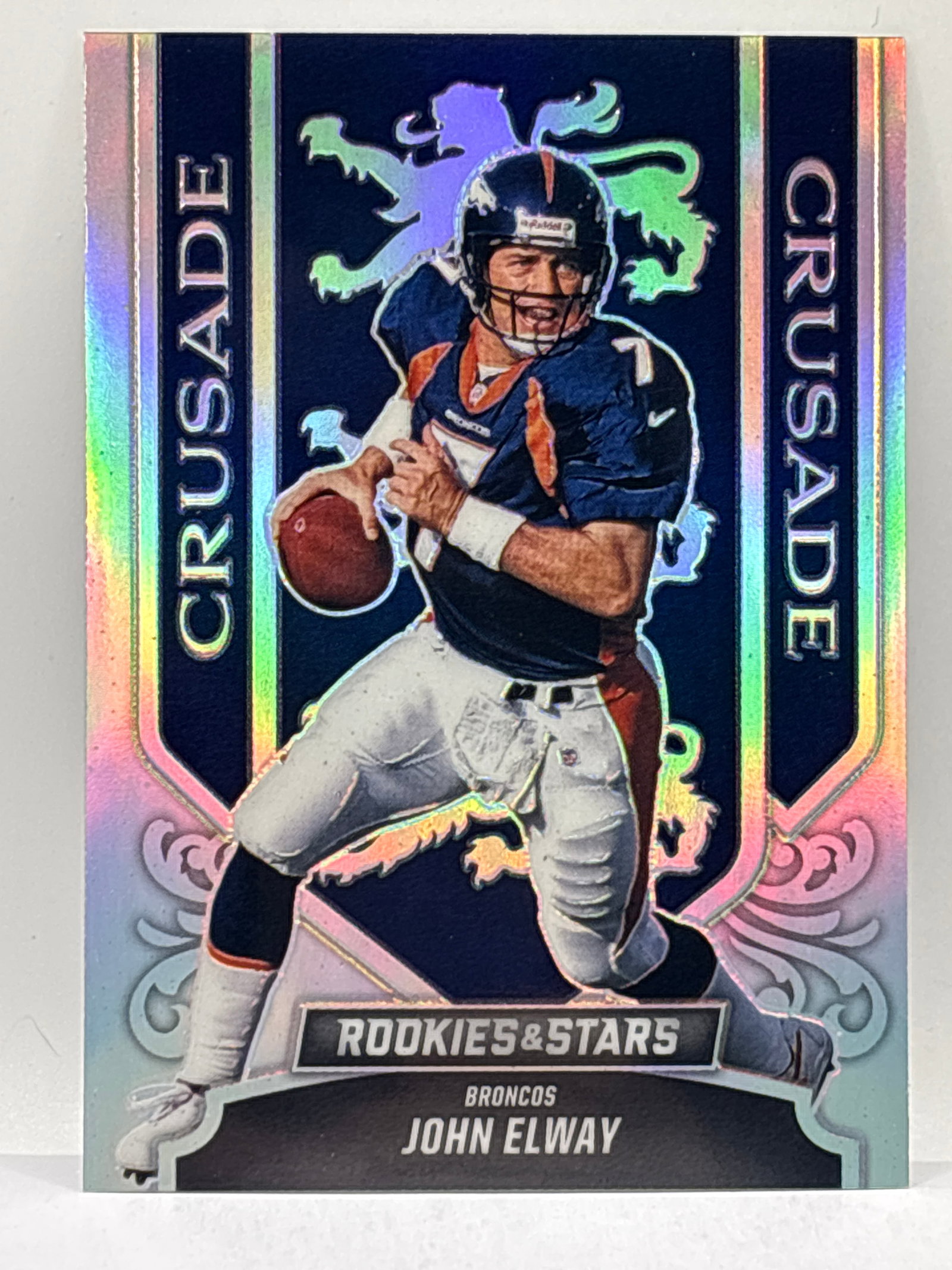 2023 PANINI ROOKIES & STARS JOHN ELWAY CRUSADES PRIZM HOLO INSERT (1 of 3)