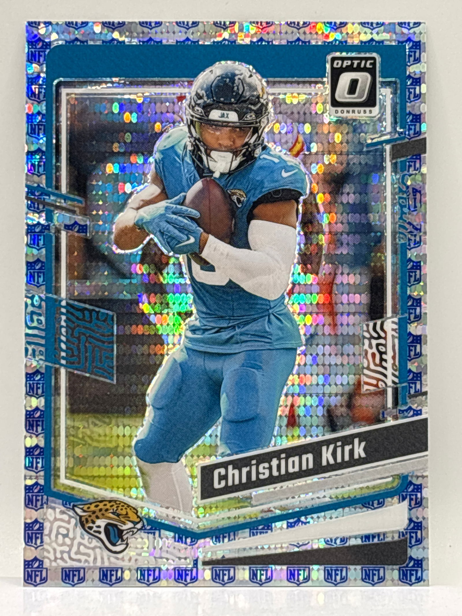 /32 2023 PANINI DONRUSS OPTIC CHRISTIAN KIRK NFL LOGO PULSAR PRIZM HOLO SSP (1 of 3)