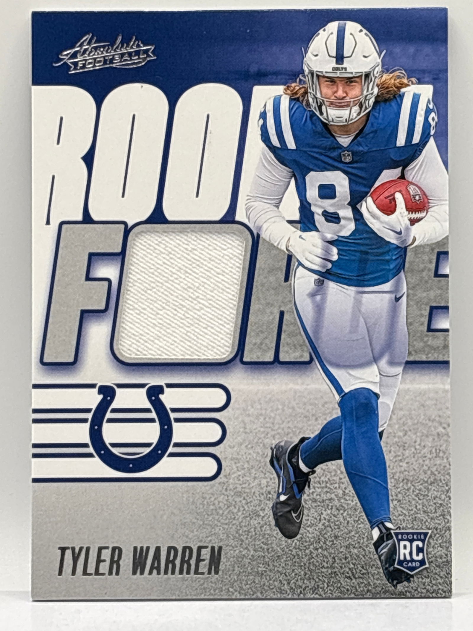 2025 PANINI ABSOLUTE TYLER WARREN ROOKIE FORCE ROOKIE PATCH (1 of 2)