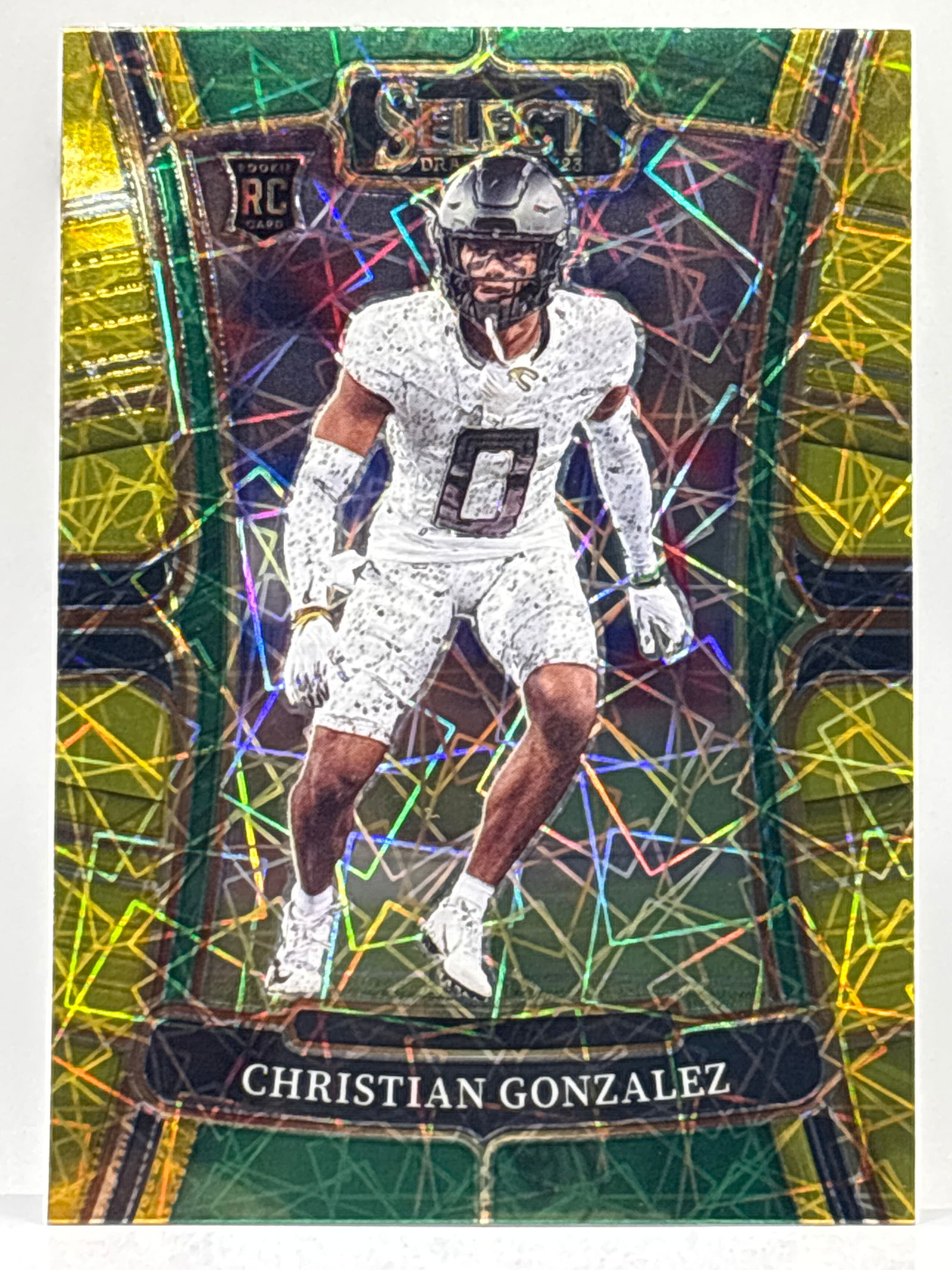 2023 PANINI SELECT DRAFT PICKS CHRISTIAN GONZALEZ GREEN & YELLOW VELOCITY PRIZM HOLO ROOKIE CARD (1 of 2)
