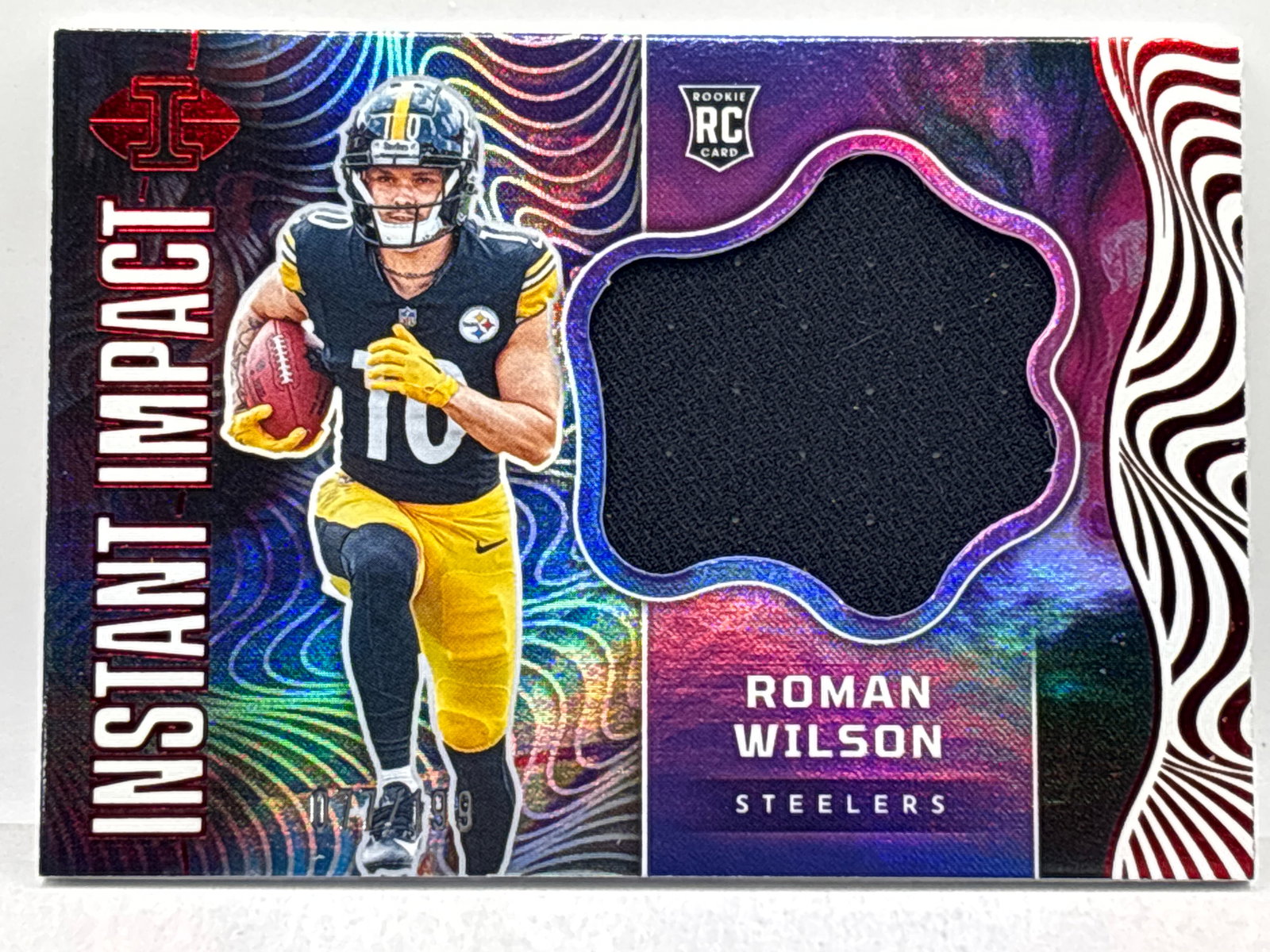/199 2024 PANINI ILLUSIONS ROMAN WILSON INSTANT IMPACT AUTHENTIC MEMORABILIA ROOKIE PATCH (1 of 3)