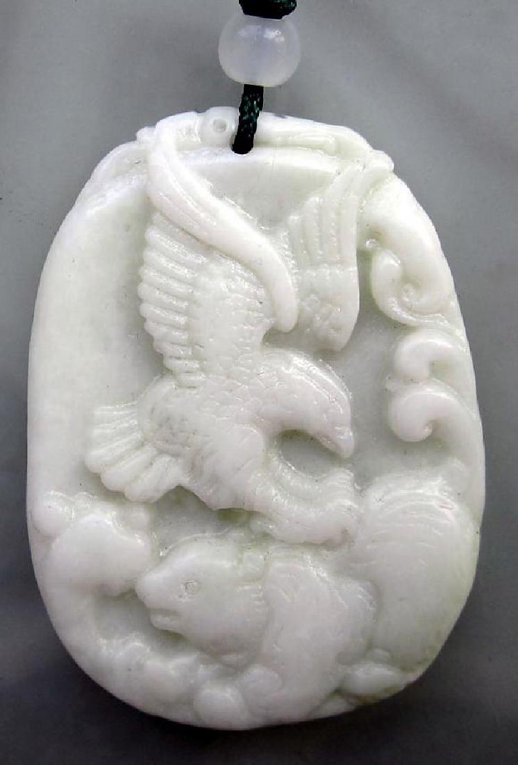 Chinese Jade Hawk Eagle Bear Pendant: Size: 45mm x 32mm This is a beautiful chinse jade pendant carved with spirit totem "Hawk Eagle & Bear". Brave hawk eagle and bear symbolize power, agility and speed. Free silk cord to make necklace. F