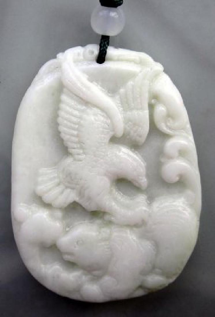 Chinese Jade Hawk Eagle Bear Pendant: Size: 45mm x 32mm This is a beautiful chinse jade pendant carved with spirit totem "Hawk Eagle & Bear". Brave hawk eagle and bear symbolize power, agility and speed. Free silk cord to make necklace. F