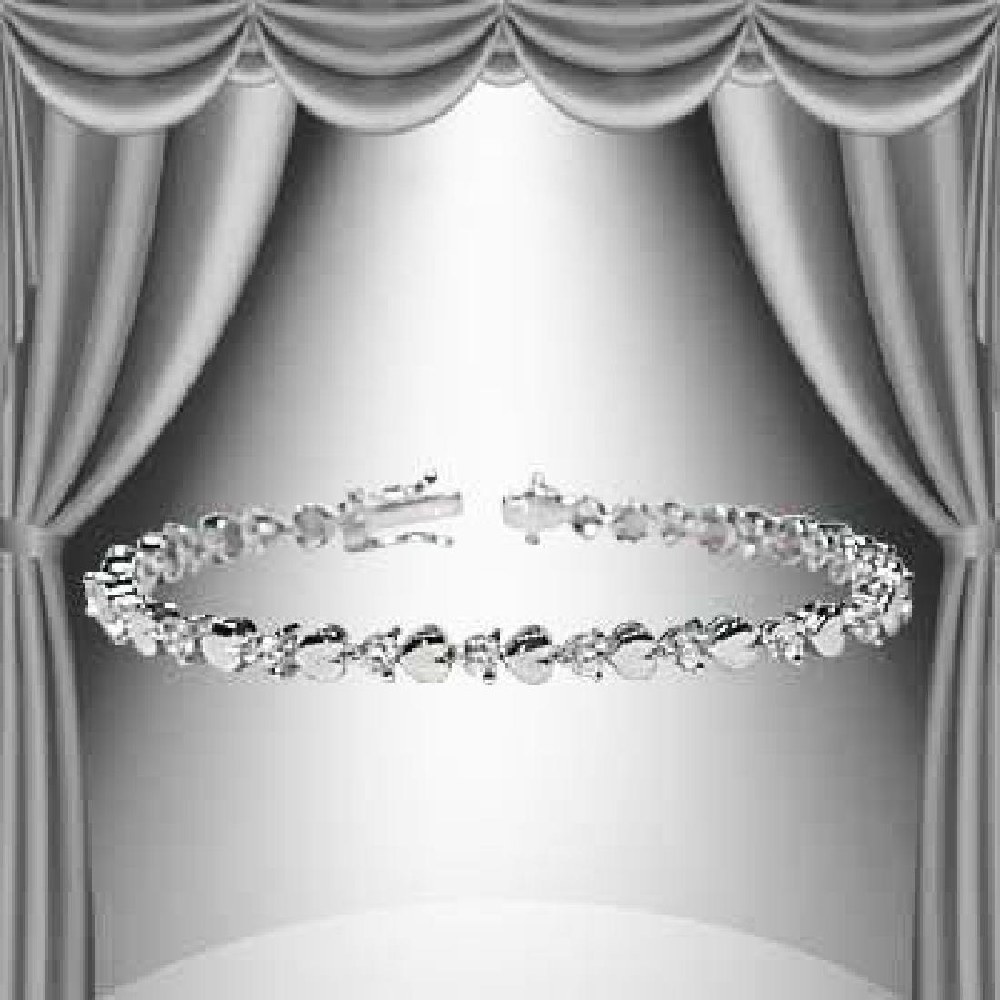 1.23 CTW Diamond and Hearts Silver Tennis Bracelet: Master jewelers designed your bracelet with 21 single cut diamonds 1.23 carat tw. 11.4 grams of sterling silver layered with 18K White Gold. Length is 7 1/2 inches.