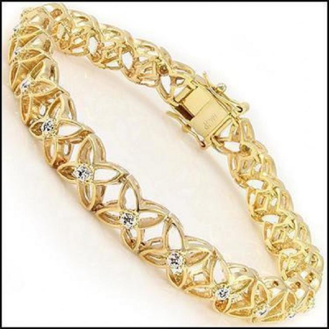 0.74 CTW Diamond Designer Bracelet: Master jewelers designed your bracelet with: 11 Single cut round diamonds 1mm quality I1-I2 . no treatment, 11.32 grams of sterling silver layered with 18K yellow Gold. Length is 7 1/2 inches. The wid