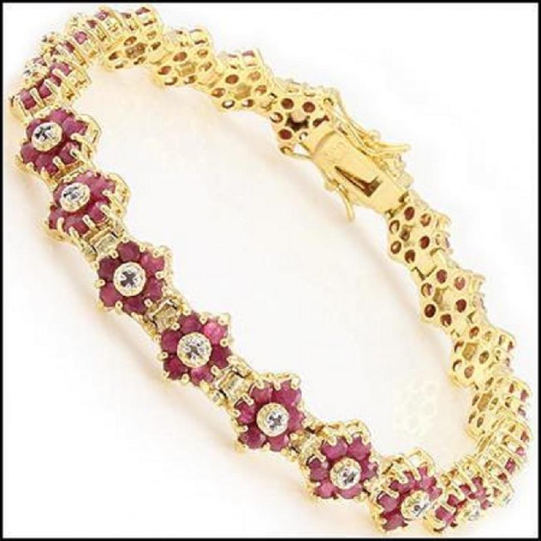 16.74 Ct Ruby & Diamond Designer Bracelet: Master jewelers designed your bracelet with: 120 pieces of GENUINE 1.5X2.5mm Round Rubies quality AAA no treatment. 16 pieces of GENUINE 2 mm faceted round diamonds. 0.23 carat Tw. I color & SI Clarit