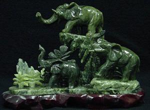 REAL JADE 3 ELEPHANTS MOUNTAIN: This beautiful art is individually made by hand. 3 elephants are on a mountain. It is an unique arts. It is made from natural green jade. L: 12", W: 4", H: 12"
