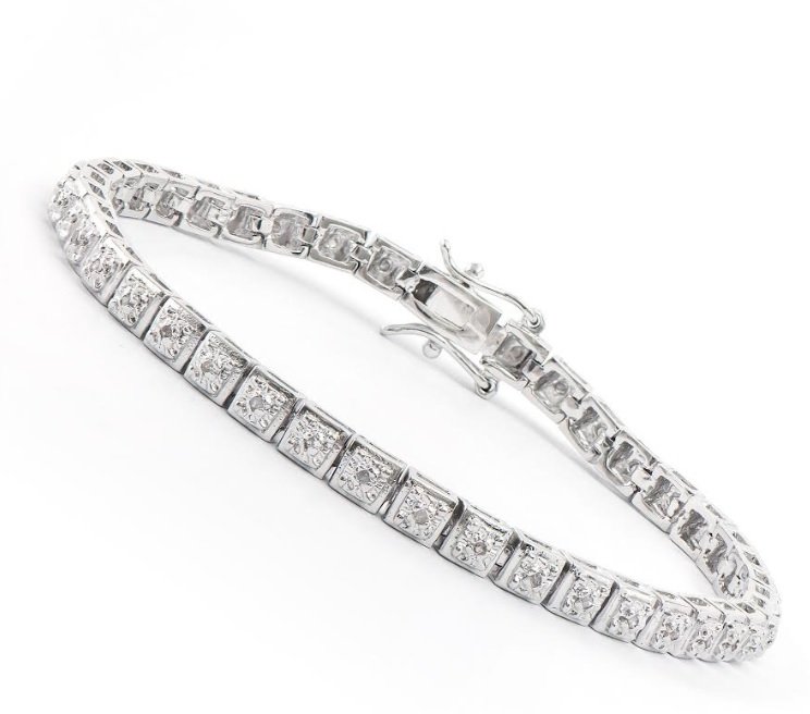 0.32 cts Designer 18KGP Diamond Bracelet $1,455: Master jewelers designed your bracelet with 41 single cut diamonds I-J Color & I2-I3 Clarity, 11.4 grams of Base Metal layered with platinum rhodium. Length is 7 1/2 inches.
