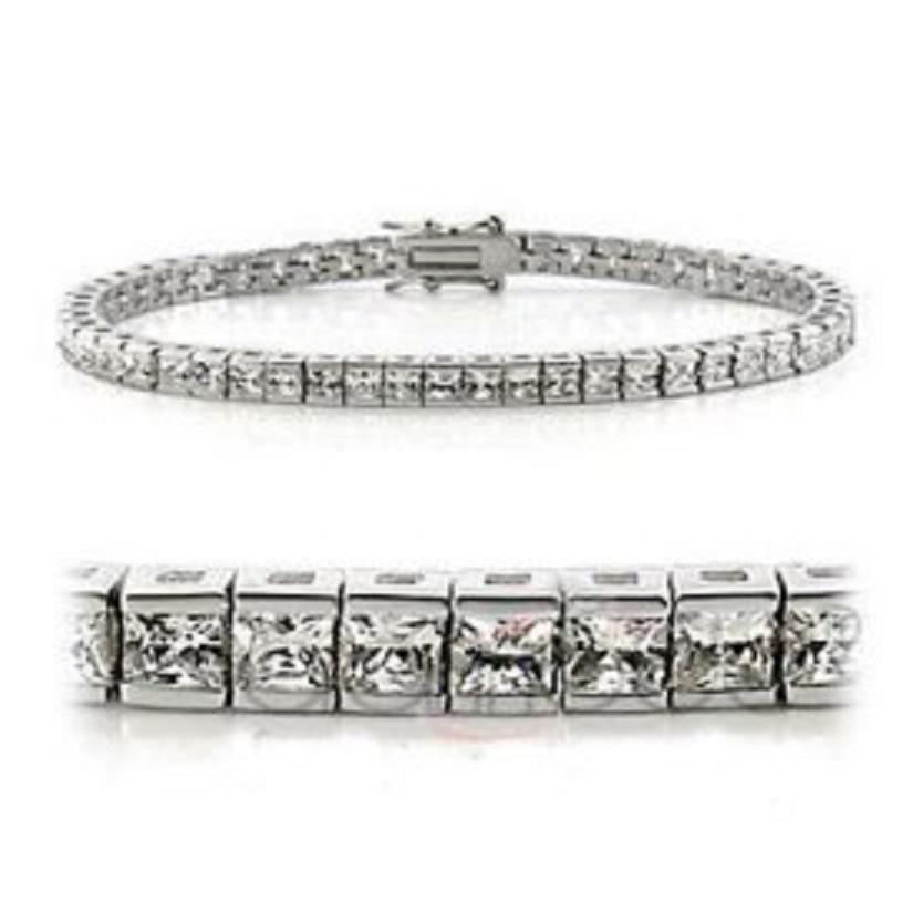 0.82 CTW Diamond Designer Bracelet $1,390: Master jewelers designed your bracelet with: 41 Single cut round diamonds 1mm, no treatment quality SI2 . 11.62 grams of Base Metal layered with platinum rhodium. Length is 7 1/2 inches. The width is 