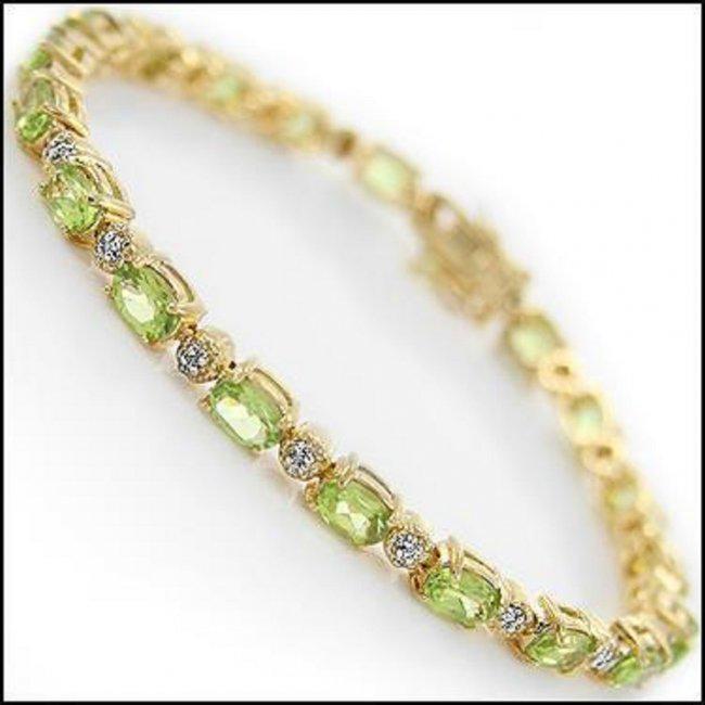 9.02 Ct Peridot & Diamond Designer Bracelet $1,335!: 20 pieces of GENUINE 6 X 4mm faceted Peridots . 4 pieces of GENUINE 1.1mm faceted round diamonds, Color: I-J & Clarity: I2-I3 No treatment. 11.42 grams of brass layered with 18K yellow gold. The brace