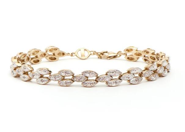 0.33 CT Diamond 18KGP Designer Bracelet: 22 Single cut 0.9 mm round diamonds Color: I-J & Clarity: I2I3 No treatment. 11.66 grams of base metal layered with 18k yellow gold. Length is 7 1/2 inches. The width is 1/4 inches.