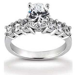 1.20 Cts Diamond Ring Appraised at $15,600: Gem: Diamond,Center: 0.43cts ,Sides: 0.77cts ,Clarity: I1-I2, Color:H-I Shape: Round 14K White Gold Weight: 2.89g.Size:7.5