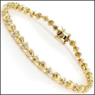 0.15 Ct Diamond 18KGP Designer Heart Bracelet: 30 Single cut round diamonds Color: I-J & Clarity: I2-I3 No treatment.18.55 grams of brass layered with 18k yellow gold.Length is 7 1/2 inches.The width is 1/4 inches.