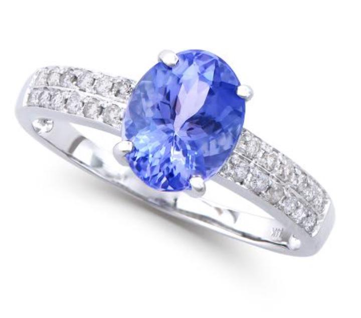 1.99 Cts Certified Tanzanite & Diamond 14k Gold Ring: Main stone: 1.80 Cts of Oval shape Tanzanite 9x7 mm quality AAA no treatment.Side: 0.19 Cts round diamonds 1.2 mm , H-I , I1-I2 no treatment.2.51 grams, 14K solid white gold, Size 7.5.Comes with signe