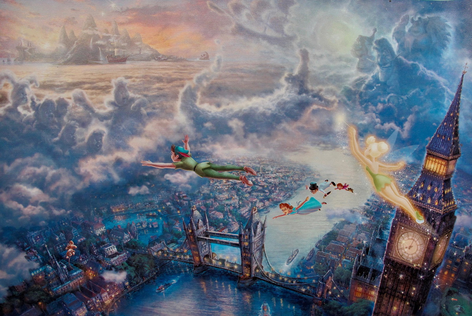 KINKADE Peter Pan & Tinker Bell Flying to Neverland: This is a reproduction giclee on canvas by Thomas Kinkade titled Â“Peter Pan and Tinker Bell Flying to NeverlandÂ”Measures: 12? x 18?. Beautiful rich colors!Comes unframed, un-stretched. Excelle