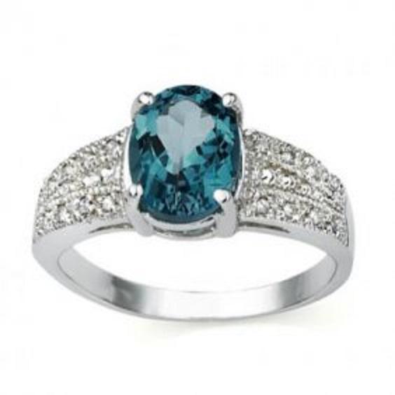 1.41 CT Certified Topaz & Diamond 14Kw Ring $4,170.00: 1.35 Ct of Oval shape London Blue Topaz 8 x 6 mm quality AAA no treatment. 0.06 Ct round diamonds 1.0 mm , I-J , I1-I2 no treatment. 3.08 grams 14K solid white gold. Size 7.5 Comes with signed certifi