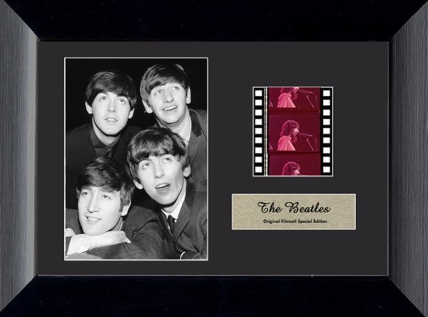 Original Film Cell THE BEATLES in Concert: This is a brand new fully framed, fully authentic filmcell with a mini poster of THE BEATLES. Get one of the coolest and newest film cell items on the market at a fraction of retail costs. It comes pa