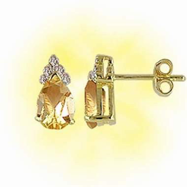 1 CT Citrine Diamond Earrings: Master jewelers designed your earrings with... 2 pieces of GENUINE 8X6mm faceted teardrop citrine. 10 pieces of GENUINE single cut diamonds .07 carat tw. 1.3 grams of sterling silver layered with 18K