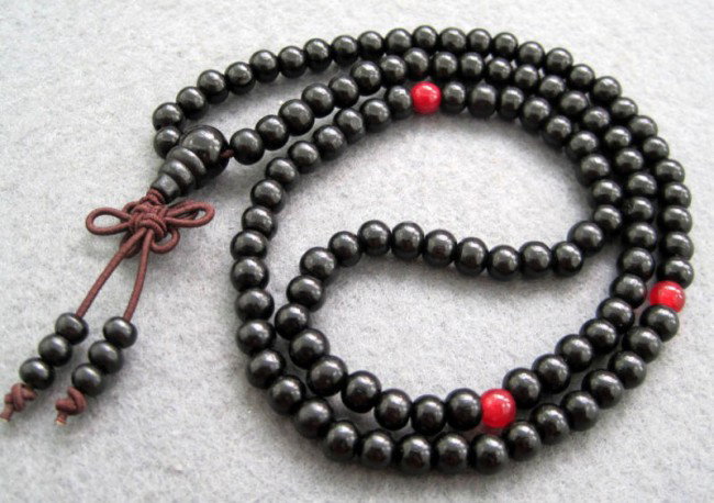 108 Black Santalwood Beads Buddhist Prayer Mala: This is a set of wooden prayer beads. They are normally used for both prayer and meditation. This set of Tibetan prayer beads was handmade. Beads Size: 6mm