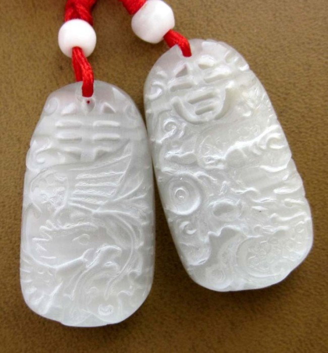 White Cat Eye Lucky Dragon Phoenix Pair Amulet Pen: The Chinese love jade because of not only its beauty, but also more importantly its culture, meaning and humanity, as Confucius (551 BC - 479 BC) said there are 11 De (virtue) in jade. Thus jade is re