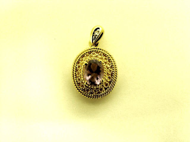 2 CT Garnet and Diamond Pendant: This is an GENUINE garnet pendant that is made of 925 sterling silver and layered with 18K Gold. The garnet is 14 mm x 10 mm. The height of the necklace motif is 1 1/32 inches or 26mm and the width is
