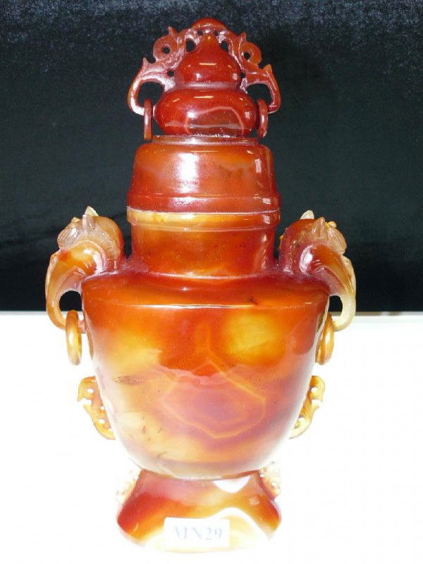 Hand Carved Natural Agate Dragon Head Flower Vase: This Flower Vase is made of NATURAL AGATE, the color is all natural, absolutely NOT dyed. All hand carved. All rings are movable. The top cover can be taken apart. It comes with a rosewood base. Very