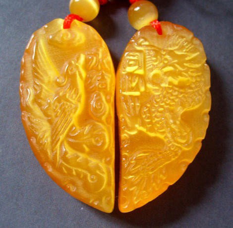 Yellow Cat Eye Dragon Phoenix Heart Pendant: It is the customary and traditional belief of Chinese people that wearing the jade is the good means of which people will be protected from bad luck, evil spirit and danger. Jade ornaments are used to