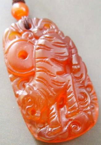 Red Agate Gem Chinese Zodiac Tiger Pendant: Agates come in many kinds and colors, and they are considered ideal material for engraving. Exploiting agate in Fuxin dates back 8,000 years, and the city is famous for its Red Agate, Green Agate and