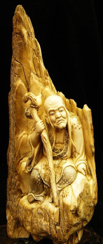 Rare Hand Carved Ivory The Old Immortal: This beautiful art is all hand carved from natural Mammoth Ivory. This is a old man resting on a mountain. It is rare and unique. Size: Wide: 3 inch, Deep: 2.5 inch, High: 7 inch. About the Mammoth Iv