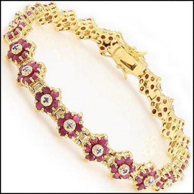 6.71 Ct Ruby & Diamond Designer Bracelet $1,840: 132 pieces of GENUINE 2.1mm Round Rubies quality AAA no treatment.22 pieces of GENUINE 1.1mm faceted round diamonds: 0.16 carat Tw.I-J color & I2-I3 Clarity no treatment.12.25 grams of brass layered w